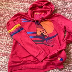 Aviator Nation Red Windsurf Hoodie with Multicolor Stripes